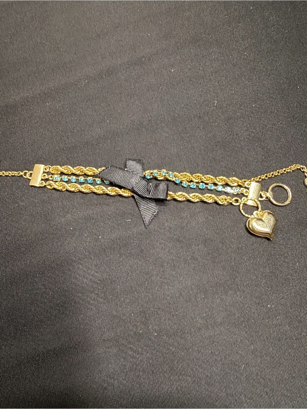 Betsey Johnson Gold-Tone Bracelet with Blue Stones and Black Bow